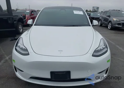 2023 Tesla Model Y Awd/Long Range Dual Motor All-Wheel Drive z USA, uszkodzony, nr VIN 7SAYGAEEXPF582955